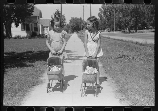 Little girls with their dolls and buggies. Caldwell, Idaho
