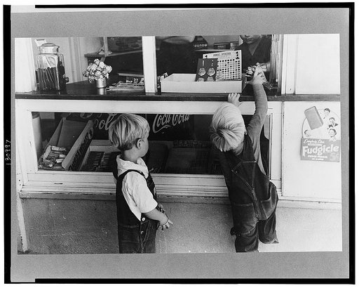 Little boys buy some candy. Caldwell, Idaho