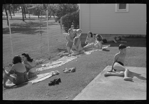 Sun bathers at the swimming pool. Caldwell, Idaho
