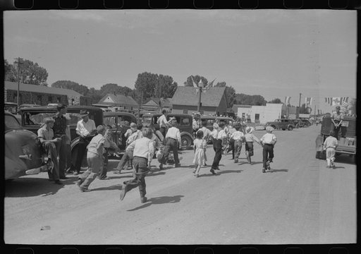 Untitled photo, possibly related to: Street scene after the Fourth of July parade at Vale, Oregon