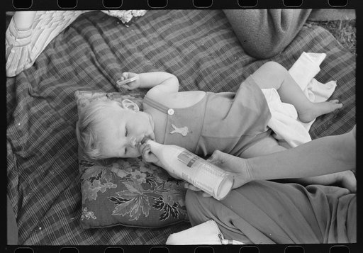 Baby at a picnic, Fourth of July, Vale, Oregon