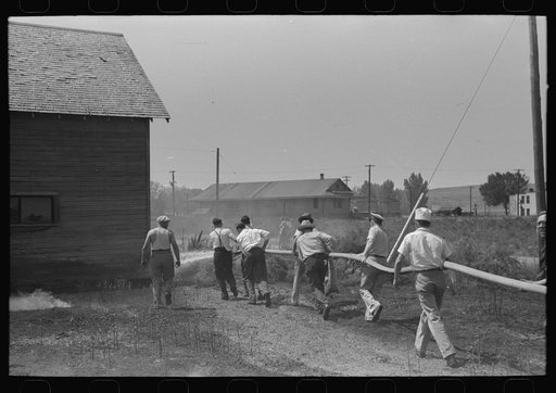 Fighting a grass fire, Fourth of July. Vale, Oregon