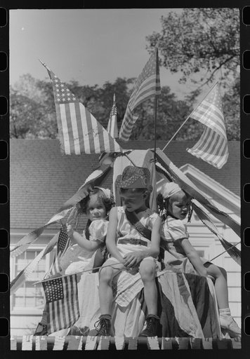 Children on float in Fourth of July parade. Vale, Oregon