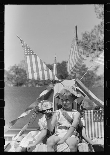 Untitled photo, possibly related to: Children on float in Fourth of July parade. Vale, Oregon