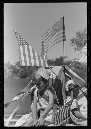 Untitled photo, possibly related to: Children on float in Fourth of July parade. Vale, Oregon