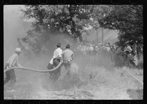 Fighting grass fire on the Fourth of July. Vale, Oregon