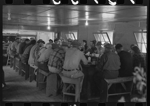 Men who work on mechanical hop picking machines have lunch at the company restaurant, Yakima Chief Hop Ranch, Yakima County, Washington