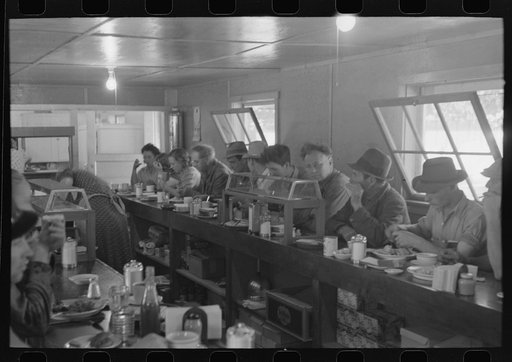 Men who work on mechanical hop picking machines have lunch at the company restaurant, Yakima Chief Hop Ranch, Yakima County, Washington