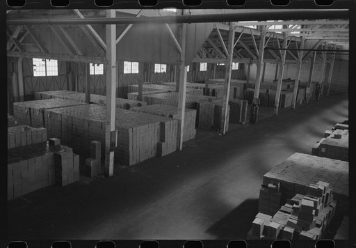 Untitled photo, possibly related to: Cases of canned salmon in warehouse, Astoria, Oregon