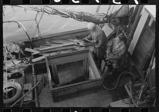 Washing off fishing boat, Astoria, Oregon