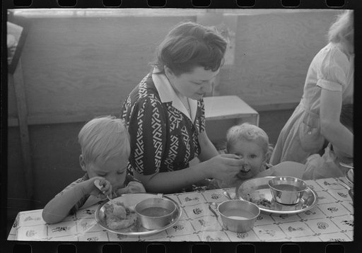 Lunch for children at the FSA (Farm Security Administration)'s mobile camp for migratory farm workers, Odell, Oregon