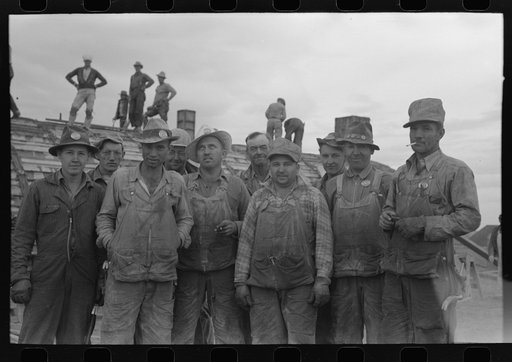 Workmen at Umatilla Ordnance Depot in front of igloo under construction, Hermiston, Oregon