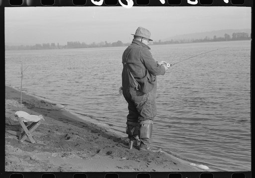 Fisherman on banks of Columbia River, Cowlitz County, Washington