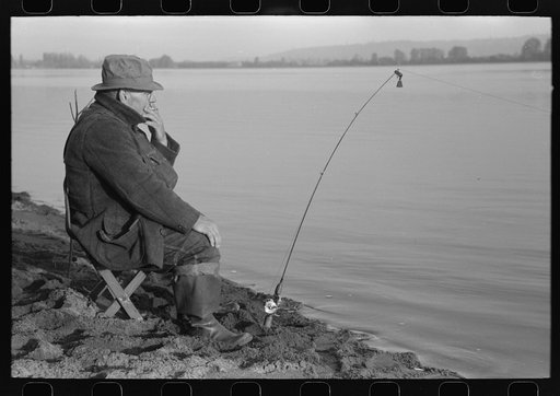 Fisherman on banks of Columbia River, Cowlitz County, Washington