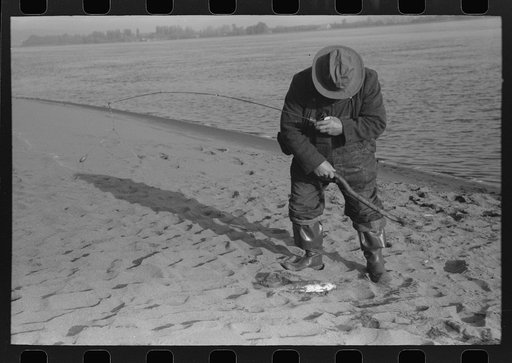 Fisherman on banks of Columbia River, Cowlitz County, Washington
