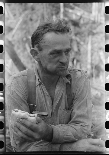 Lumberjack eats lunch, Long Bell Lumber Company, Cowlitz County, Washington