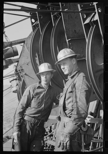Greaser in wheel house in main tower, Shasta Dam, Shasta County, California