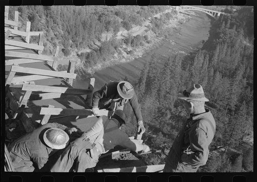 Putting concrete on Pit River Bridge which is above Shasta Dam, Shasta County, California