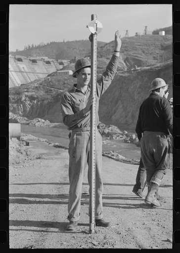 Untitled photo, possibly related to: Workman in the surveying crew at Shasta Dam, Shasta County, California