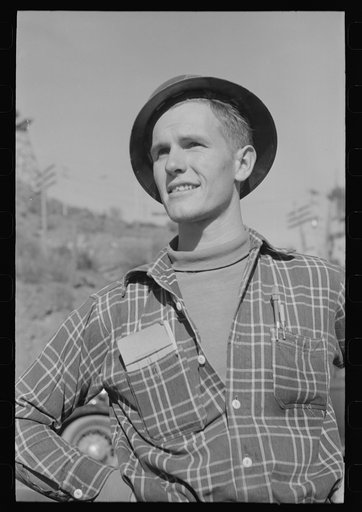 Workman at Shasta Dam, Shasta County, California