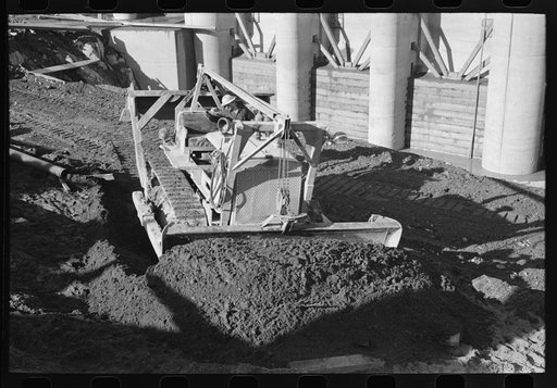 Bulldozer at work at Shasta Dam, Shasta County, California