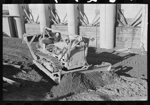 Bulldozer at work at Shasta Dam, Shasta County, California