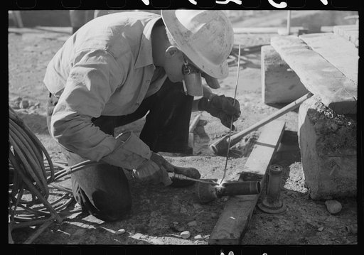 Welder at Shasta Dam, Shasta County, California