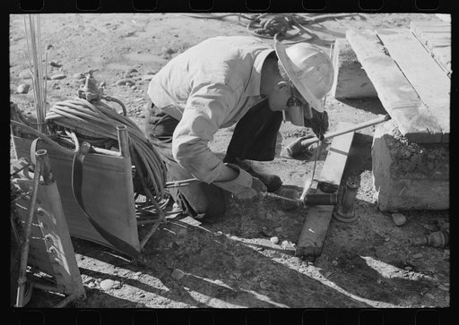 Welder at Shasta Dam, Shasta County, California