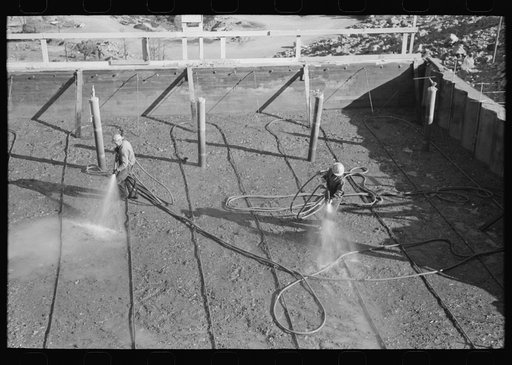 Wetting down freshly-poured concrete, Shasta Dam, Shasta County, California
