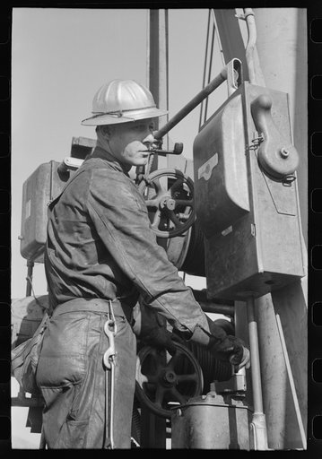 Operator of buckets which deliver materials to construction points of Shasta Dam, Shasta County, California