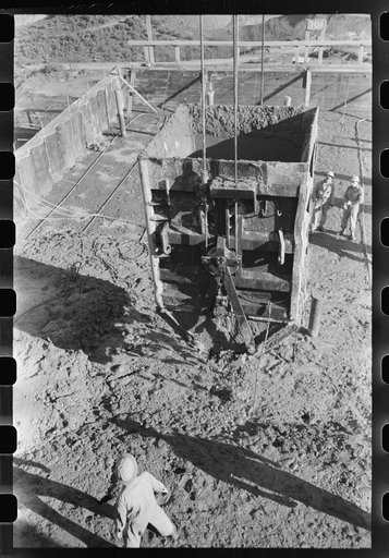 Dumping bucket of concrete in construction of Shasta Dam, Shasta County, California