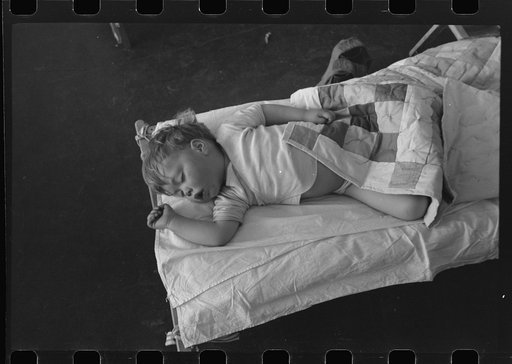 Nap time in the nursery school at the FSA (Farm Security Administration) farm workers community, Woodville, California