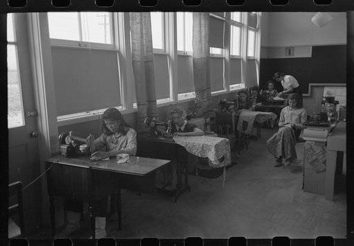 Untitled photo, possibly related to: Eleven Mile Corner, Arizona. FSA (Farm Security Administration) migratory workers community. Home economics class
