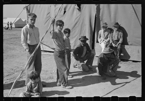 Untitled photo, possibly related to: Agricultural workers play marbles. Yuma County, Arizona
