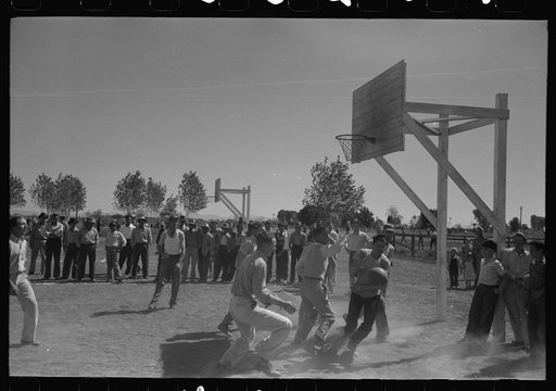 Basketball games at annual field day at the FSA (Farm Security Administration) farmworkers community, Yuma, Arizona