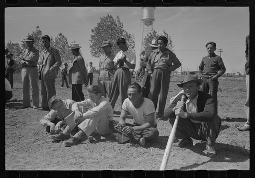 Watching baseball game at the annual field day at the FSA (Farm Security Administration) farmworkers community, Yuma, Arizona