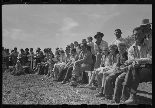 Watching basketball game at the annual field day at the FSA (Farm Security Administration) farmworkers community, Yuma, Arizona
