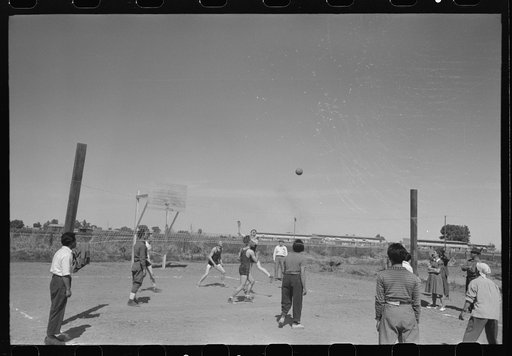 Volleyball game at the annual field day at the FSA (Farm Security Administration) farmworkers community, Yuma, Arizona