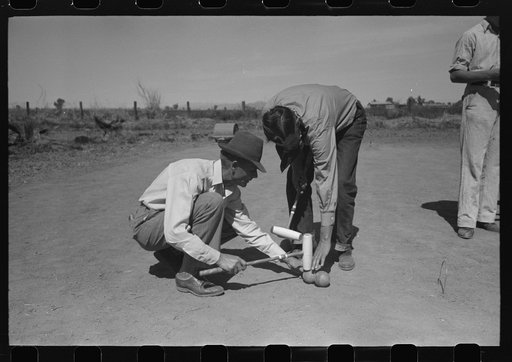 Croquet game at the annual field day of the FSA (Farm Security Administration) farmworkers community, Yuma, Arizona