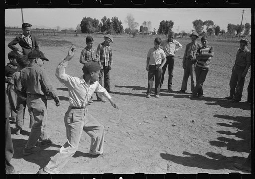 Top spinning contest at the annual field day of the FSA (Farm Security Administration) farmworkers community, Yuma, Arizona