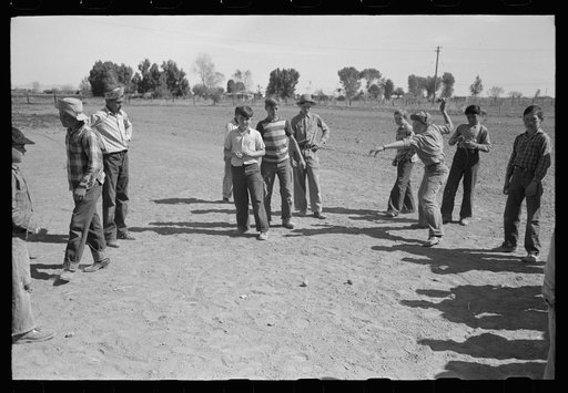 Top spinning contest at the annual field day of the FSA (Farm Security Administration) farmworkers community, Yuma, Arizona
