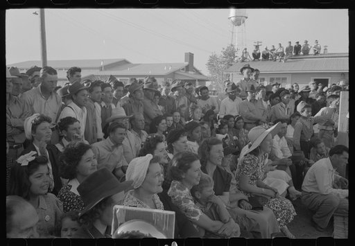 Watching the boxing match at the annual field day of the FSA (Farm Security Administration) farmworkers community, Yuma, Arizona
