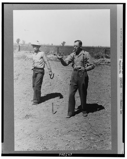 Horseshoe pitching contest at the annual field day of the FSA (Farm Security Administration) farmworkers community, Yuma, Arizona