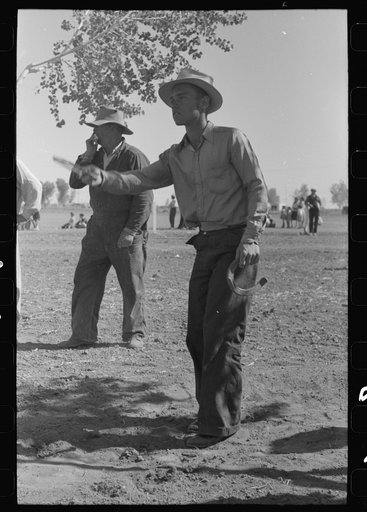 Untitled photo, possibly related to: Horseshoe pitching contest at the annual field day of the FSA (Farm Security Administration) farmworkers community, Yuma, Arizona