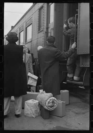 Los Angeles, California. The evacuation of the Japanese-Americans from West Coast areas under U.S. Army war emergency order. Japanese-Americans boarding a train for Owens Valley