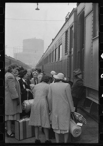 Los Angeles, California. The evacuation of the Japanese-Americans from West Coast areas under U.S. Army war emergency order. Japanese-Americans boarding a train for Owens Valley