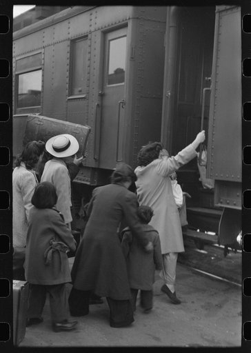 Los Angeles, California. The evacuation of the Japanese-Americans from West Coast areas under U.S. Army war emergency order. Boarding a train for Owens Valley