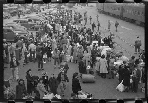 Los Angeles, California. The evacuation of the Japanese-Americans from West Coast areas under U.S. Army war emergency order. Japanese-Americans and a few alien Japanese waiting for a train which will take them to Owens Valley