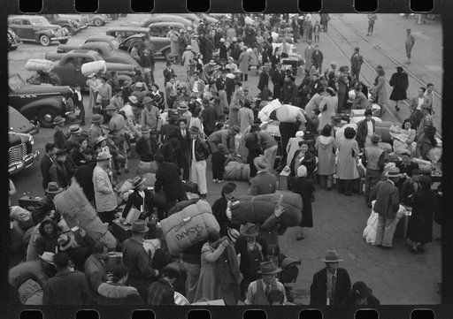 Los Angeles, California. The evacuation of the Japanese-Americans from West Coast areas under U.S. Army war emergency order. Japanese-Americans with their baggage waiting for trains which will take them to Owens Valley