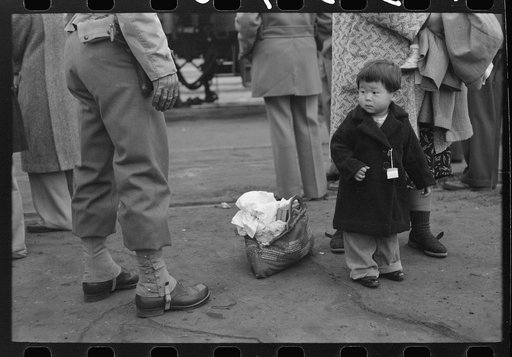 Los Angeles, California. Japanese-American evacuation from West Coast areas under U.S. Army war emergency order. Japanese-American child who will go with his parents to Owens Valley